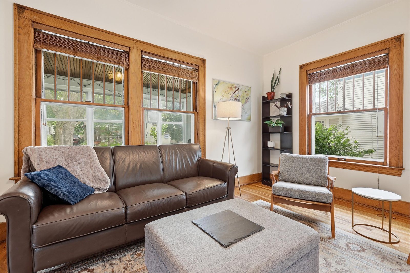 Living room with original woodwork and fireplace